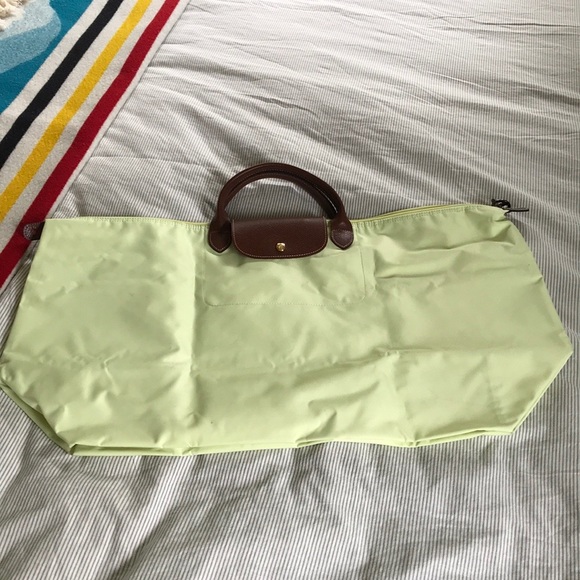 Longchamp Handbags - Preloved Longchamp XL duffle Le Pliage original💛🤎